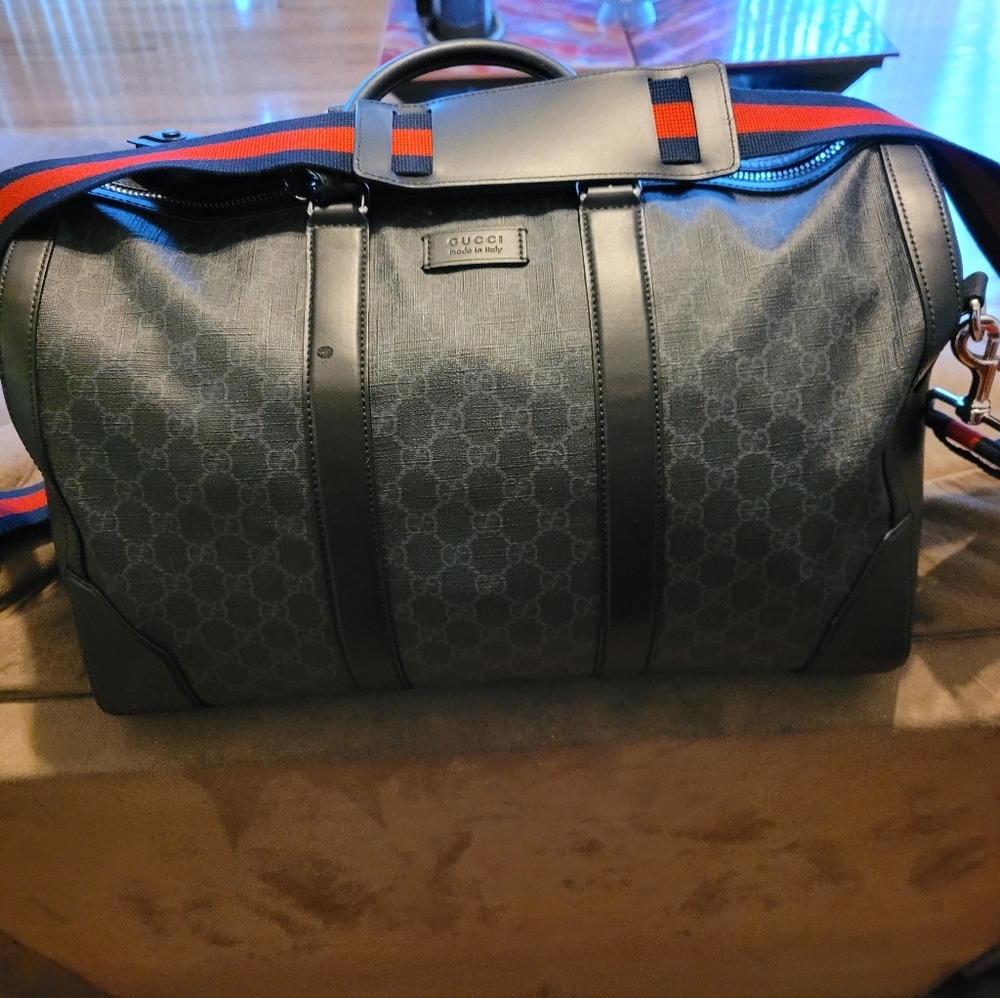 Gucci soft GG supreme carry-on duffle